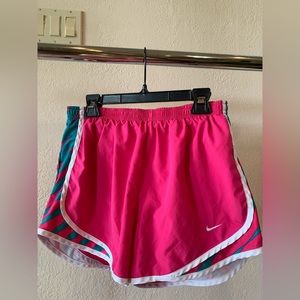 8 pairs of women’s Nike shorts & 3 pairs of athletic shorts